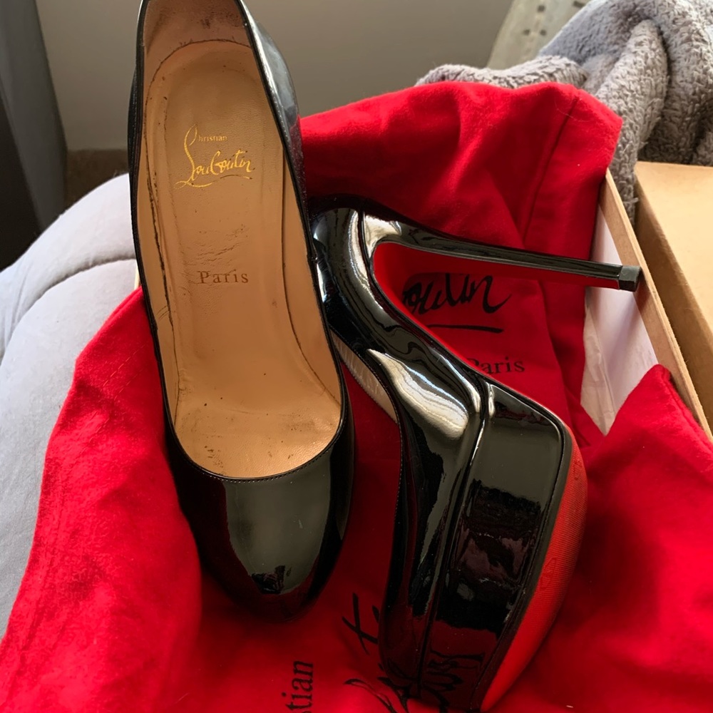 Authentic platform Christian Louboutin heels.